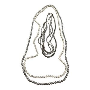 3 necklaces. 2 freshwater pearls in silver & gray. Choker is steel gray. JB1